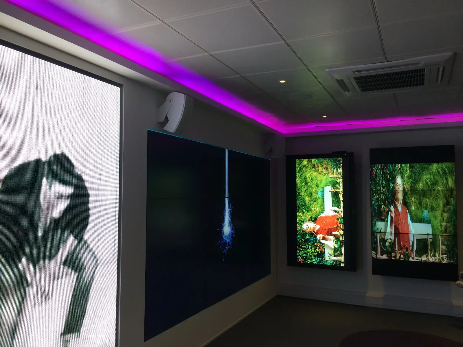PEL UK Offices space with designer furniture and wall mounted digital screens 8